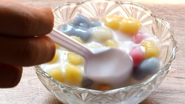 Dumplings in coconut cream or Bua Loi, Thai famous dessert .