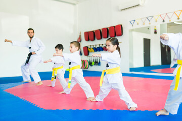 Kids practicing martial arts sports