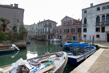The canals in Venice with gondolas and boats, traditional vehicels of transport in Venice, Italy