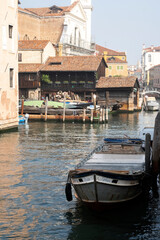 The canals in Venice with gondolas and boats, traditional vehicels of transport in Venice, Italy