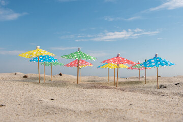 (cocktail) umbrellas on the beach