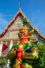 the Yaksha statue in front of  Wat Pho Bang Khla in Chachoengsao, Thailand. The temple known more for its bats (Lyle's flying fox, Pteropus lylei ) than its Buddhas.