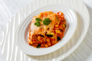 enchilada casserole with veggies, corn, pinto bean