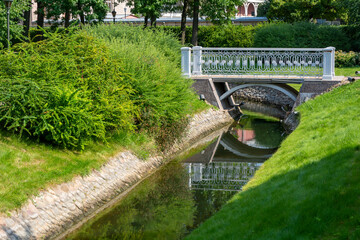 Decorative pedestrian bridge over a small canal