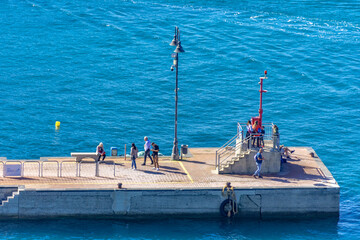 Pier tourists in the Agropoli marina, by Cilento Coast, Italy