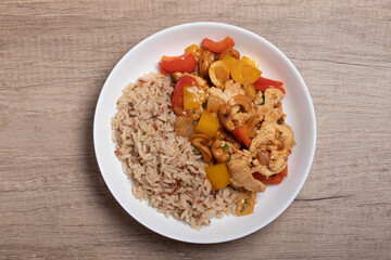 Brown rice with stir-fried vegetables and eggs. Healthy food.