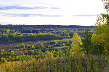 Fototapeta na wymiar Autumn panorama of the Sylva river valley from the top of Mount Podkamennaya