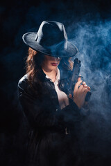 Silhouette: a female detective in a coat and hat with a gun in her hands. Dramatic noir portrait in the style of books and detective films of the 1950s.