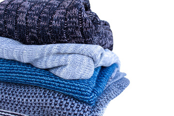 Closeup of folded sweaters, png