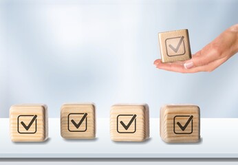 Checklist concept, Check image on wooden cubes or blocks