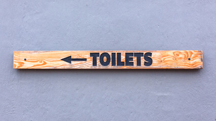 Signboard Words Toilets Directions Wall Outdoors
