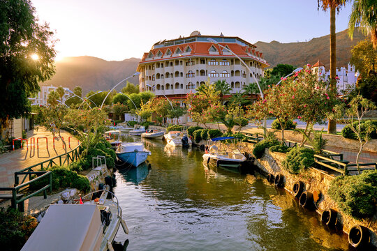 Sunset and river in the city of Icmeler in Turkey