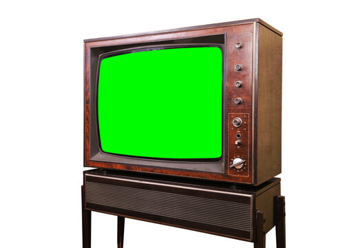 Old vintage TV with green screen isolated on white background. Side view.