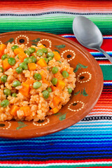 メキシコの伝統的な米料理　アロス・ア・ラ・メヒカーナ　コピースペースあり　Traditional Mexican rice dish Arroz a la Mexicana with copy space