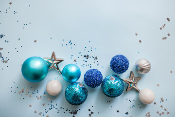 
Christmas or New Year's flat lay composition of various decorative elements, sparkles and...
