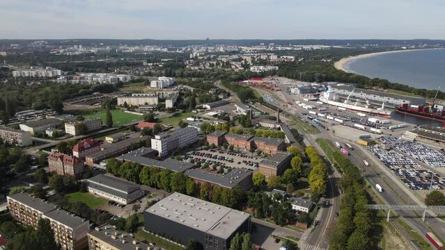 Aerial view of the New Port in Gdansk ,ships,port canal and the gulf of Gdansk on a summer ,sunny day 8 september 2022