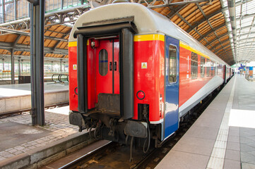 Obraz premium Carriages for passengers standing on the platform before the departure of the train. Journey.