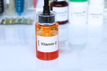 Vitamin C pills in a bottle, food supplement for health