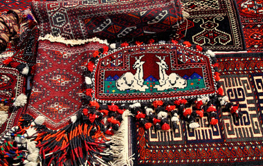 Handmade carpets with traditional ornament. Turkmenistan. Ashkhabad market. - 542714912