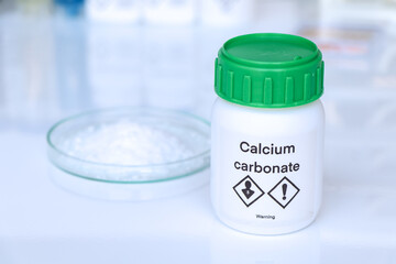 Calcium carbonate in bottle, chemical in the laboratory and industry