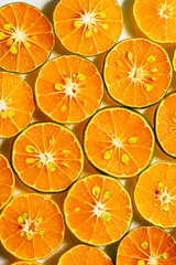 macro orange background,Heap of fresh orange slices background. Healthy nutrition with vitamin c. Close up view.