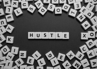 Letters spelling out hustle