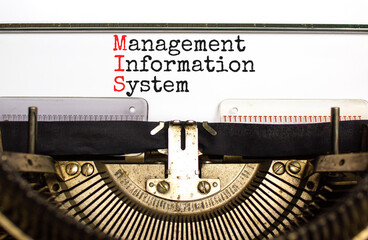 MIS management information system symbol. Concept words MIS management information system typed on retro typewriter. White background. Business MIS management information system concept. Copy space © Dzmitry