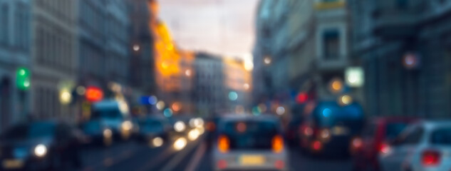 blurred urban traffic in an old city with colorful lights, abstract traffic background concept with...