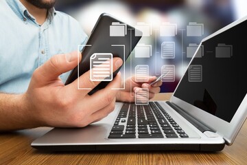 Business person works with documents on computer