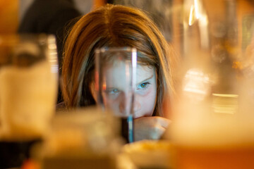 Beautiful tired blonde girl in a pub