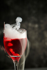 Alcohol and smoke in broken glass