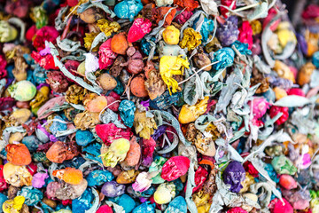 Fototapeta na wymiar Colorful dried flowers on a market in a bazaar in Marrakech, Morocco, North Africa