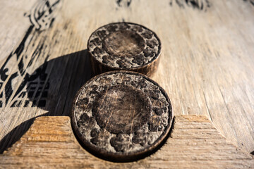 Old wooden backgammon. Backgammon chips close-up on the board