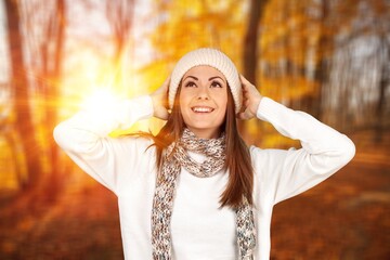 Cheerful young happy female in park