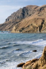Beautiful landscape. Waves on the Black sea. Sand mountains. The picturesque nature of the Crimea.