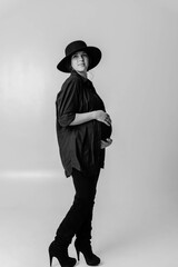 pregnancy, motherhood, people and expectation concept - close up of happy pregnant woman with big belly