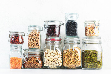 Legumes and beans. Dried, raw and fresh. Lentils, chickpeas, mung beans, soybeans, edamame, peas in...