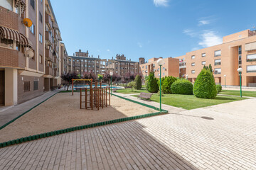 Fototapeta premium Garden, recreation area and games within a residential housing development