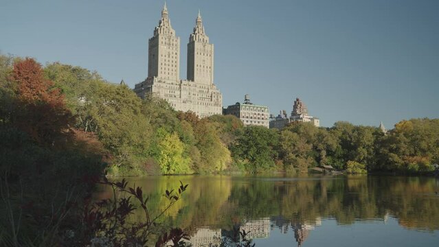 Central Park Lake and The San Remo Buildings during Fall Foliage Manhattan, New York City, USA