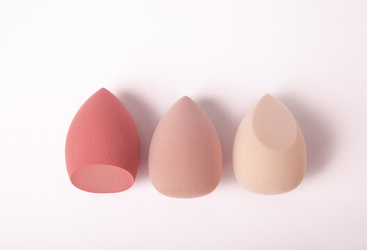 Beauty blender isolated on white background. Bright sponges for cosmetics. Makeup products. Beauty concept. MOCKUP.