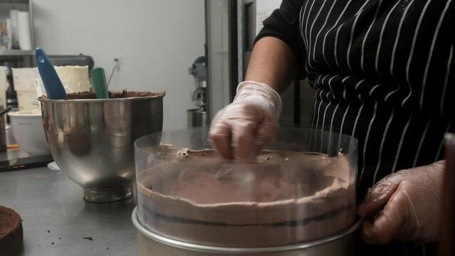 chef preparing Cake before selling it to a client
