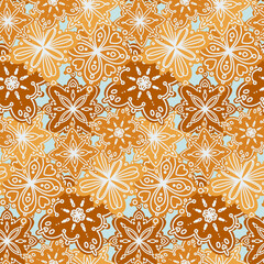 Seamless pattern of gingerbread in the form of snowflakes decorated with sugar icing. Background for packaging, invitations, fabrics and any design. Traditional background design.
