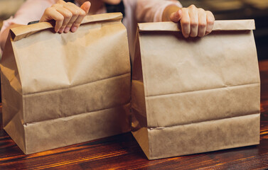 dessert paper bag waiting for customer on counter in modern cafe coffee shop, food delivery, cafe...