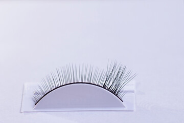 The process of training eyelash extension 3d close-up on a white background