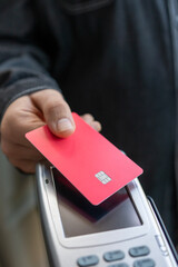 contactless payment by credit card and pos terminal.