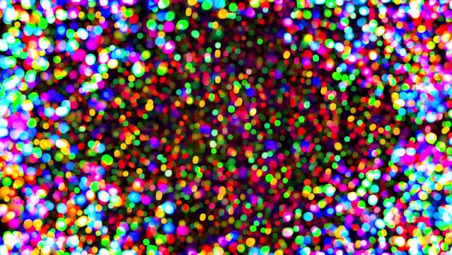 A composite seamless loop video of vibrant festive Christmas falling bokeh light particles backdrop with a diamond static bokeh lights frame in a retro style with flickering light lens flare glint.
