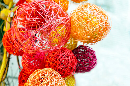 Multicolored balls of dry plant stems background.