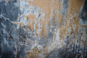 Dark background wall for vintage design. Cracks in the gray concrete surface, cracked old walls