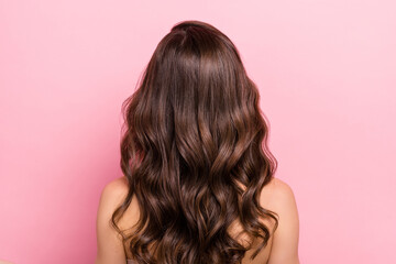 Rear back behind view portrait of attractive wavy-haired girl shine hairdress isolated over pink pastel color background