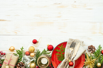 Christmas food, christmas table setting with craft plate, cutlery, gift box and christmas...